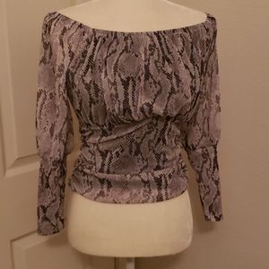 Snakeskin blouse and faux leather skirt
